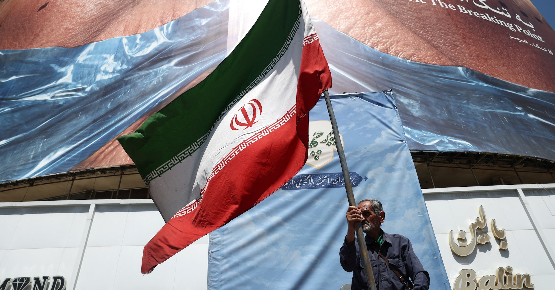 US says it struck Iranian military sites, Tehran responds with air base attack