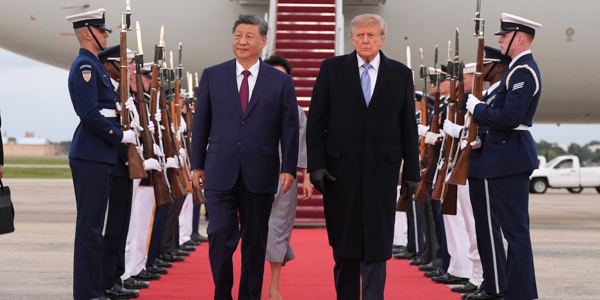 China’s Xi arrives in Washington, kicking off his state visit with rare planeside welcome from Trump